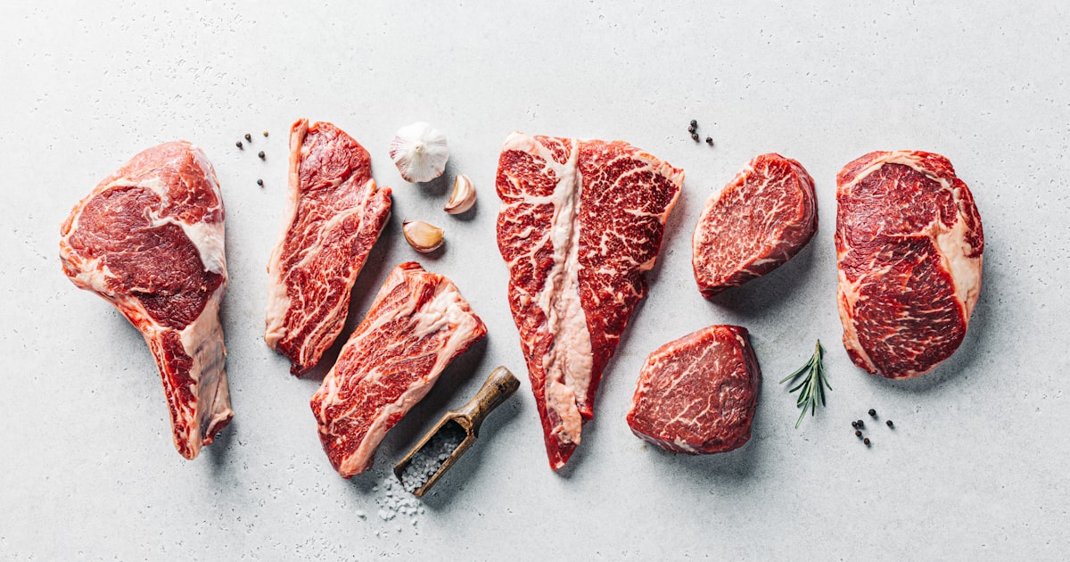a group of raw meats on a table — Clube Prime, Empório Família Rodrigues